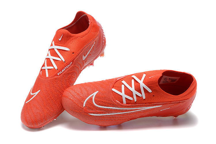 Chuteira Nike Phantom GX Low Elite FG Campo